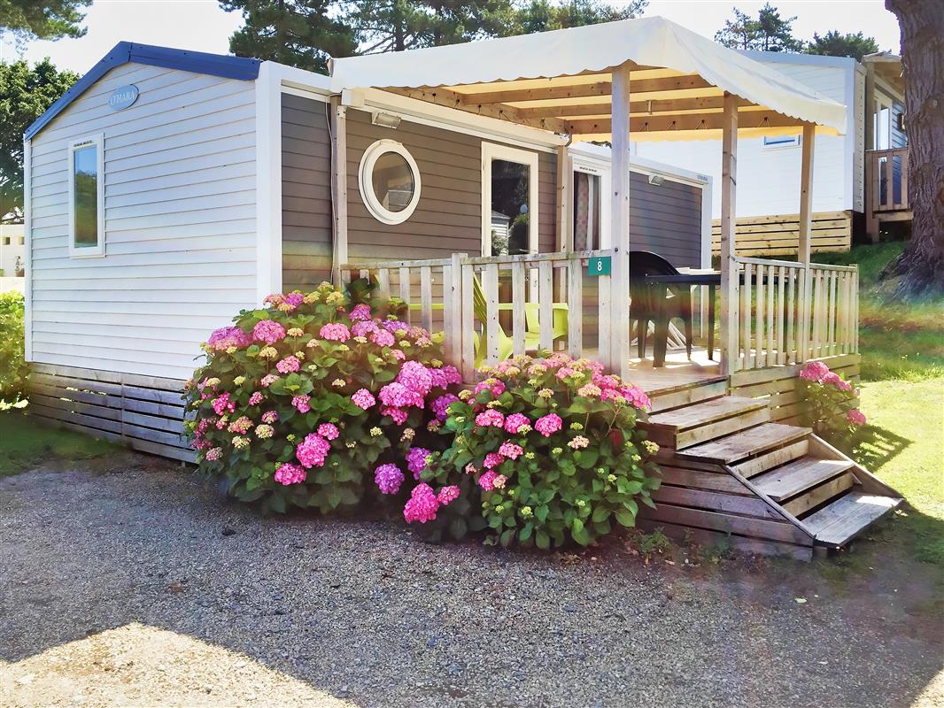 Mobilhome Grand Confort Camping avec piscine et accès à la plage de
