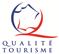 "French Quality" logo featuring a stylized rooster